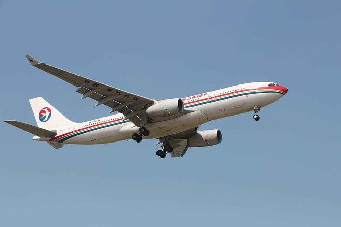Shanghai Pudong Airport Private One-Way or Round-Way Transfer in English Service - Meet-and-greet in arrivals: what happens after you land