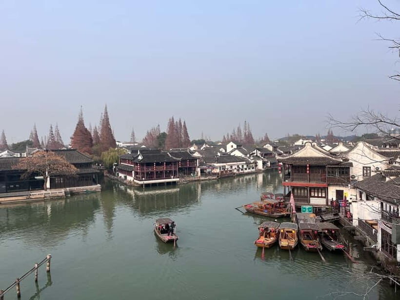 Shanghai: Zhujiajiao Water Town with Calligraphy Experience - Fangsheng Bridge and the Canal Loop You’ll Want to Repeat