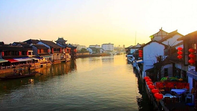 Shanghai: Zoo and Zhujiajiao Water Town Tour with Boat Ride - Zhujiajiao on foot: the tallest bridge, Ming and Qing architecture, and market time