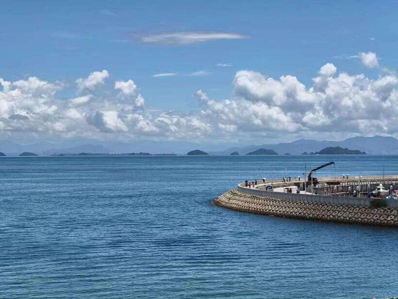 Shenzhen: Dapeng Peninsula Day Tour with Hotel Pickup - Yangmeikeng Seaside: Green Hills, Streams, and Easygoing Views