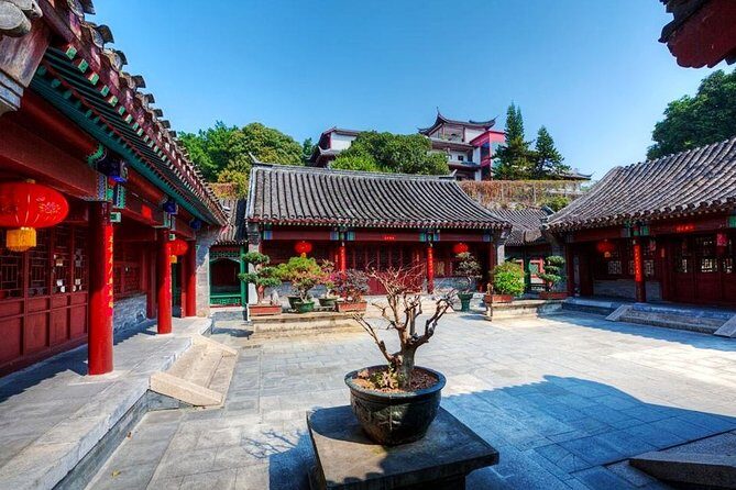 Shenzhen Private Flexible Day Tour with Guide and Driver Service - China Folk Culture Village: culture-themed time without the guesswork
