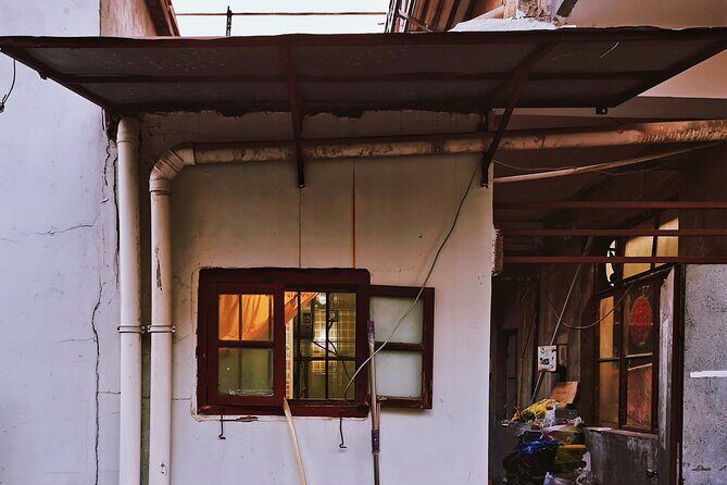 Small-Group Shanghai's Old City Walking Exploration - Stop 2: Longmen Cun (South Gate) and shikumen houses