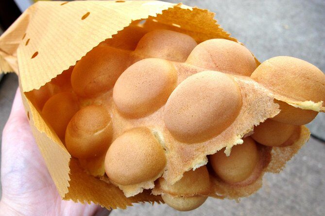 Small-Group Tour: The best bites of Hong Kong Island - Classic stall tastings: roast pork belly, egg puffs, and egg tarts