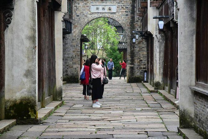 Wuzhen and Xitang Water Town Private Full Day Trip from Shanghai with Lunch and Dinner - Wuzhen and Xitang: Two Water Towns, Two Very Different Moods