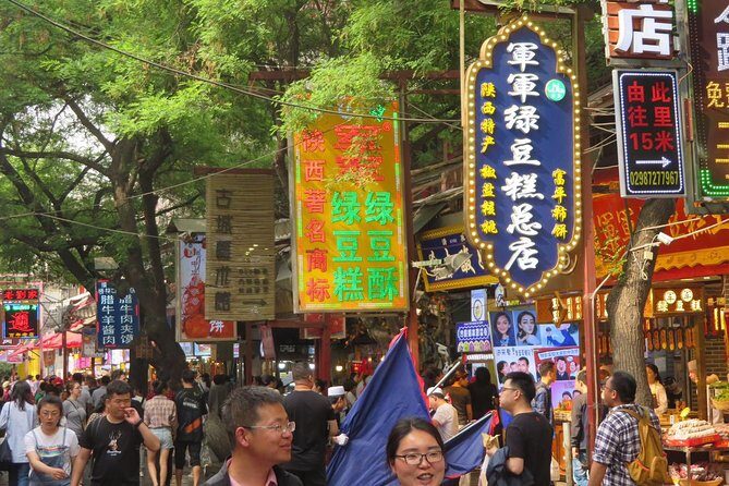 Xi'an Authentic Food Tour with Local Beverages - Bell Tower Stop: A Landmark With Instant Context
