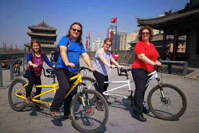 Xi'an City Center Private Cycling and Walking Tour - Cycling Chengqiang City Wall for about three hours