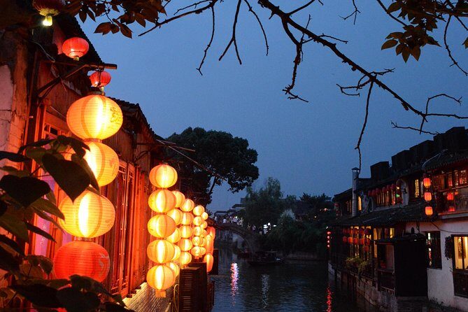 Xitang Water Village Sunset Tour with Riverside Dining Experience from Shanghai - Xitang Ancient Town at sunset: lantern alleys and the Mission: Impossible route