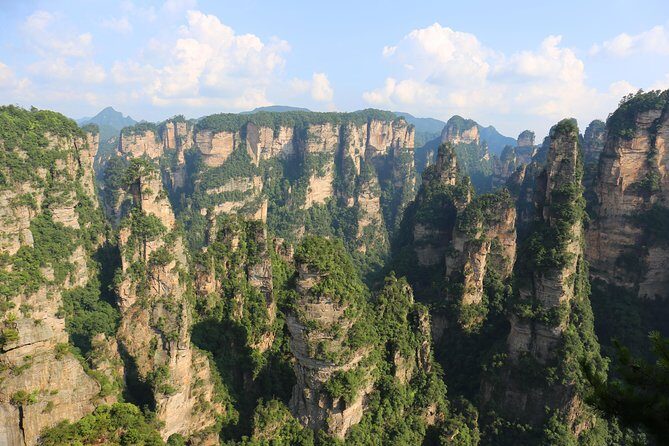 Zhangjiajie 3 days funny highlight private tour - Day 2: Yellow Dragon Cave, Glass Bridge height shock, and Grand Canyon river walks